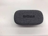 Grey fabric textured Boltune charging case with logo on top, closed with visible texture.