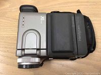 Sony Handycam Mini DV Camcorder, silver and black with 120x digital zoom, visible wear