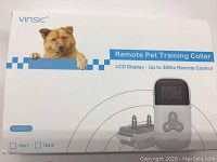 Box showing Vinsic remote pet training collar branding and product image with LCD remote and collar.