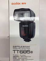 Box showing Godox TT685S TTL camera flash for Sony with product name and features.