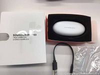 SoundLiberty 53 earbuds in charging case with USB cable and box