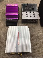 Lot showing Pyramid Pro Plus PB-110PX amplifier, Numark DM950 mixer, and Craig Powerplay 350 amplifier on carpet.