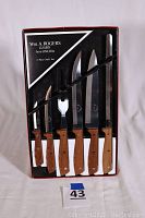 Full view of boxed 6-piece William A. Rodgers chef's knife set with wood handles.