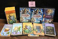 Set of 3 DVDs with 6 paperback books from The Chronicles of Narnia, Pan's Labyrinth and Labyrinth DVDs visible.