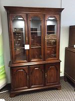 Front view of assembled buffet and hutch showing overall design, finish and hardware