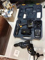 Mastercraft cordless drill set with carrying case, two batteries, and charger.