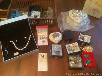 Overview of all jewelry sets on table