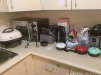 Countertop view showing all appliances and accessories grouped together