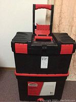 Closed Jobmate rolling tool box with red handle and latches.