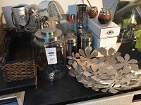 Assorted background items with glass beverage dispenser and kitchen canisters