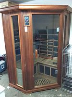 Front exterior view of cedar wood corner infrared sauna