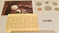 Set of six 1985 Canadian coins in uncirculated condition sealed in plastic, accompanied by informational inserts from the Royal Canadian Mint.
