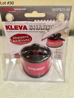 Front view of KLEVA Sharp knife sharpener in original packaging showing product and retail price of $29.99