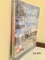 Photo of one notebook with cover text 'When it rains look for rainbows. When it's dark look for stars' showing inspirational design and title