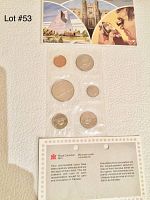 Full layout of the 1984 Royal Canadian Mint Uncirculated Coin Set including front display card and all six coins in plastic holders