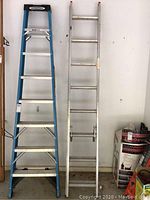Both Werner ladders side by side in garage