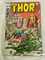 Front cover of The Mighty Thor comic #190 showing Thor, Loki, and another character. The cover shows signs of wear, discoloration and edge damage.