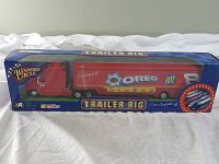 Front view of new boxed die cast trailer rig truck with Oreo and Ritz branding and NASCAR logos.
