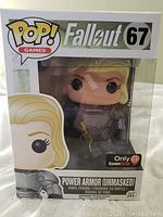Front view of unopened Funko Pop box showing Power Armor (Unmasked) figure numbered 67, with GameStop exclusive sticker.