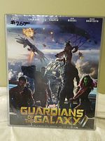 8×10 photograph in clear protective sleeve showing all five signatures and marker price