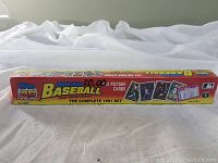 Side view of the sealed yellow box featuring Topps 40ths logo and description of contents - 792 cards, complete 1991 set.