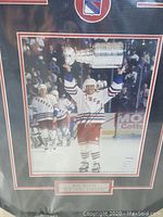 Framed 8x10 signed photo with Mark Messier holding the Stanley Cup