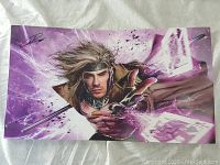 Front view of the Marvel Gambit print showing the character throwing energy-charged cards and the artist's signature.
