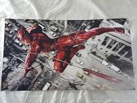 Front view of the signed Daredevil print showing the character and signature.
