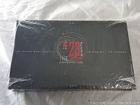 Front view of sealed black collector's box for Michael Jordan 23 Nights Experience by The Upper Deck Company, showing logo and text.