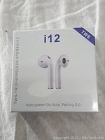 Front packaging showing i12 TWS wireless earbuds with text Auto power-On Auto Pairing 5.0
