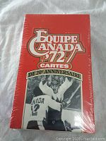 Front view of sealed box showing 'Equipe Canada 72 Cartes' and hockey players celebrating.