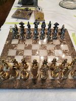 Full front view of board with all chess pieces set for play
