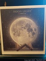 Box packaging of the moon light showing moon image and 3D printing text