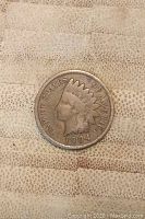 Obverse side of the 1904 Indian Head Penny displaying the Native American chief and inscriptions.