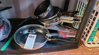 Pan and knife lot including glass lid pan and various frying pans and knives in original packaging