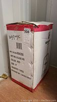 Box labeled for Heys Xcase NS luggage, red color, size 18 inch, gross/net weight listed