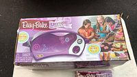 Box of Easy-Bake Ultimate Oven showing product image and branding.