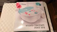 Boxed Focus Hydro-Therapy Foot Spa unit showing product image and branding.