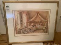 Full view of framed and matted print showing gold frame and white mat
