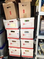 Stack of white archive-style storage boxes