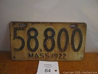 Front view of the porcelain license plate showing number 58,800 MASS 1922 with visible wear and rust.