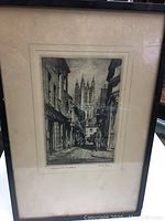 Framed black and white print showing detailed street and cathedral sketch with visible title 'Butchery Lane Canterbury'