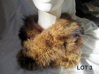 Front view of the brown vintage fur collar displayed on mannequin neck showing texture and color