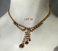 Full view of the delicate vintage 16-inch rhinestone necklace showing double strands and dangling pendant.