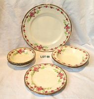 Full set of Alfred Meakin china with Rosecliffe pattern, showing multiple plates and bowls arranged together.