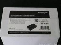 Box of StarTech Composite and S-Video to VGA Video Converter with product details and warranty info