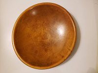 Top view showing full round shape and interior wood grain pattern