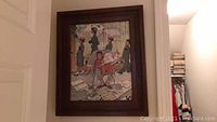 Vintage-style framed print of children reading newspapers, dark wood frame visible on wall