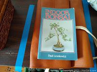 Front cover of the Indoor Bonsai book by Paul Lesniewicz showing a bonsai tree in a pot.