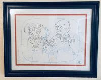 Front view of the framed pre-production Keebler Elves sketch showing the elves and stars inside a black wood frame with cream mat and orange border.